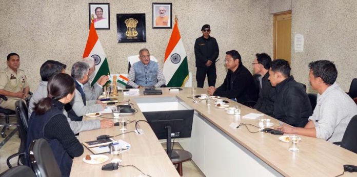 LG Kavinder Gupta chairing a meeting at Leh on Tuesday.
