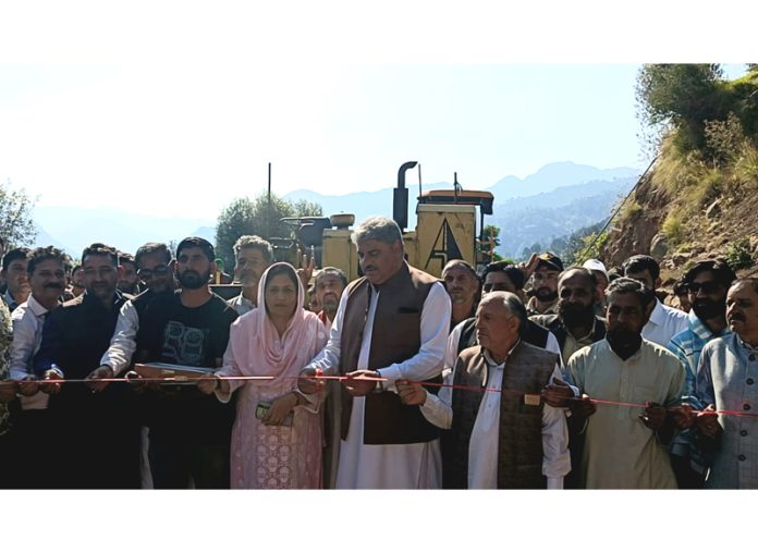 MLA Sajjad Shaheen inaugurating blacktopping work on Ashmar-Krara road in Sangaldan. MLA Sajjad Shaheen inaugurating blacktopping work on Ashmar-Krara road in Sangaldan.