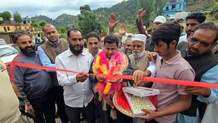 MLA Iftikhar Ahmed inaugurating a road project in Potha area of Rajouri on Monday.