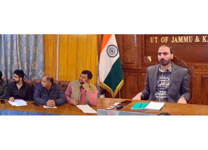 DC Pulwama chairing a meeting to review progress of PM Surtya Ghar Muft Bijli Yojana.