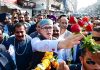 CM Omar Abdullah receiving rousing welcome in Jammu City on way to Civil Secretariat on Monday.