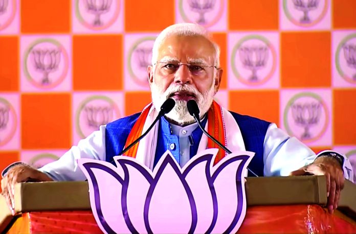 Prime Minister Narendra Modi speaking during the public rally organised for the Bihar Assembly elections, in Arrah on Sunday.