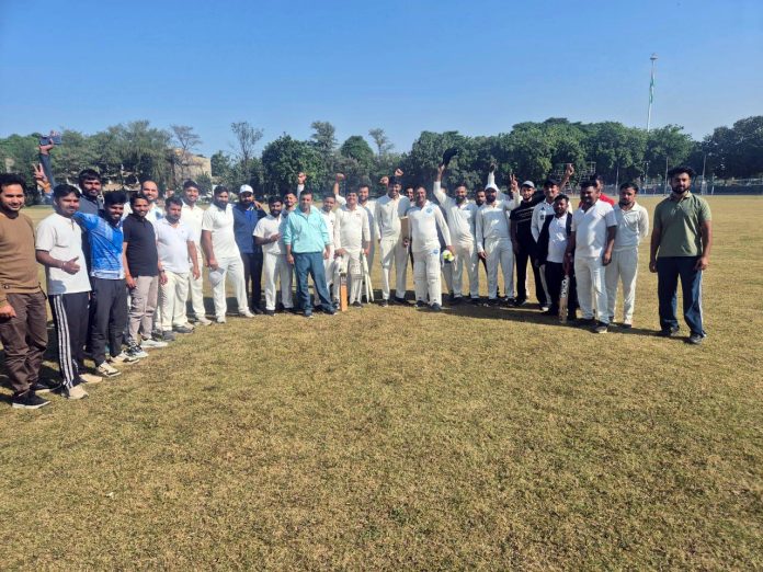 Cricket teams posing during a match.