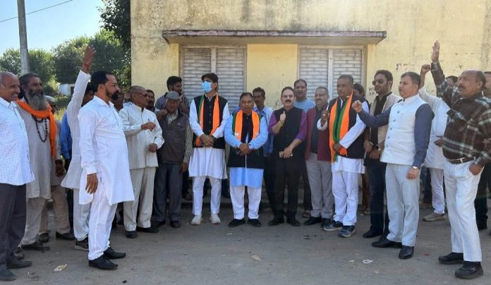 BJP leaders led by party president, Sat Sharma during election campaigning in Nagrota constituency on Saturday