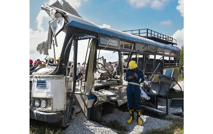 Mangled remains of the TGSRTC bus involved in an accident near Khanapur in Rangareddy on Monday. Mangled remains of the TGSRTC bus involved in an accident near Khanapur in Rangareddy on Monday.