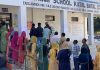 People queue up to cast votes at Katal Batal in Nagrota on Tuesday. -Excelsior/Rakesh