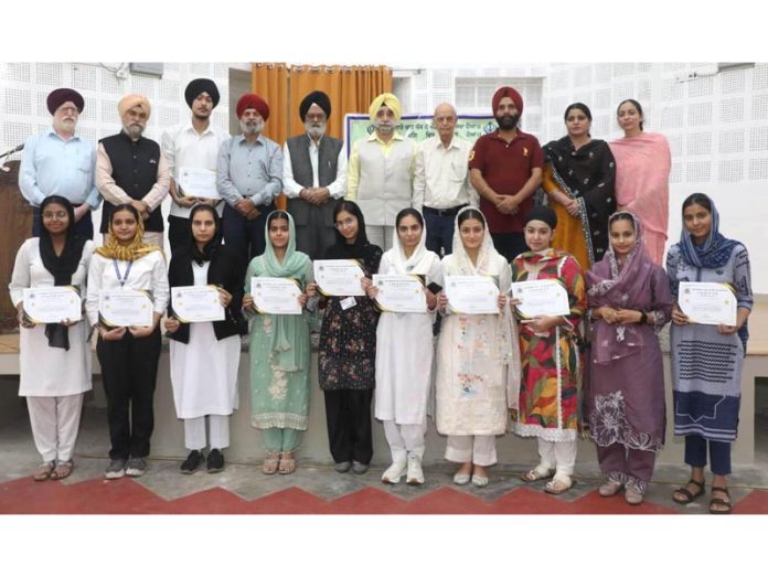 Poets, students and others during Punjabi Kavi Darbar organised by JKAACL in Jammu on Thursday.