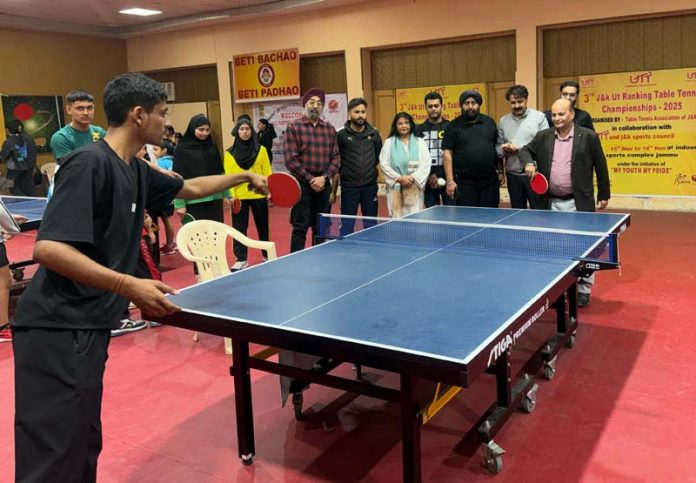 Dignitary displaying his skills during an inaugural event of TT Championship at Jammu. Dignitary displaying his skills during an inaugural event of TT Championship at Jammu.