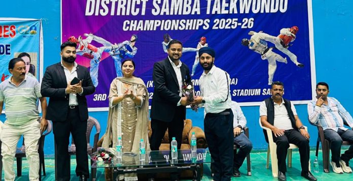 Dignitary presenting award to a player during an event.