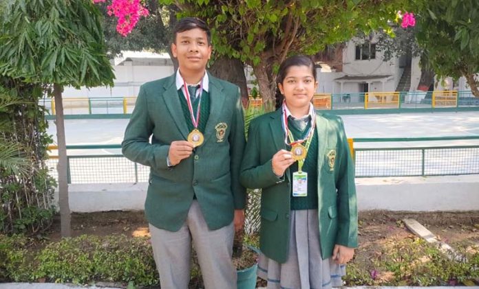 DPS students posing with medals. DPS students posing with medals.