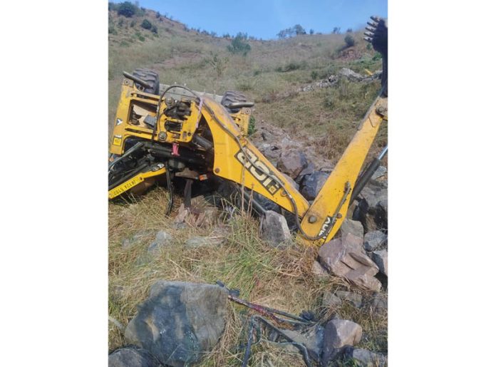 A JCB machine in gorge in Chandak area of Poonch. -Excelsior/ Waseem A JCB machine in gorge in Chandak area of Poonch. -Excelsior/ Waseem
