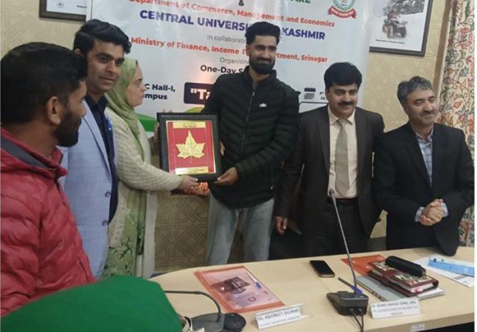 A dignitary being felicitated at the Central University of Kashmir on Thursday. A dignitary being felicitated at the Central University of Kashmir on Thursday.