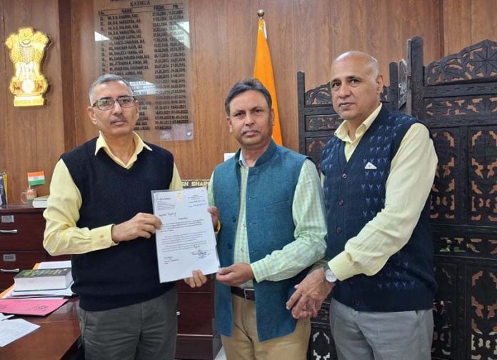 MLA Dr Bharat Bhushan handing over authorization letter of funds to DC Kathua Rajesh Sharma on Thursday.