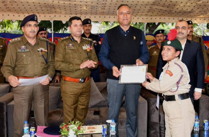 A dignitary presenting certificate to a NCC candidate after a training programme at CTI HG/CD, Kot Bhalwal, Jammu. A dignitary presenting certificate to a NCC candidate after a training programme at CTI HG/CD, Kot Bhalwal, Jammu.
