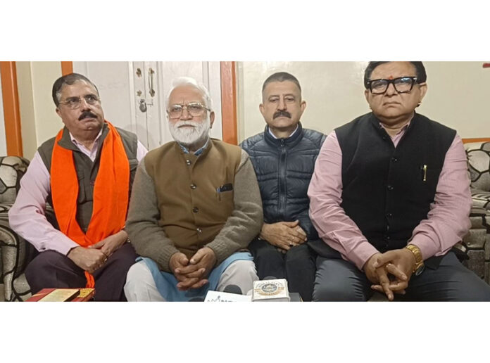 Purushottam Dadhichi along with others chairing a meeting in Jammu.