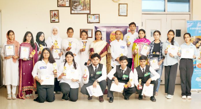 Winners posing for a group photograph during an event organized by Everest BKCC in Jammu.