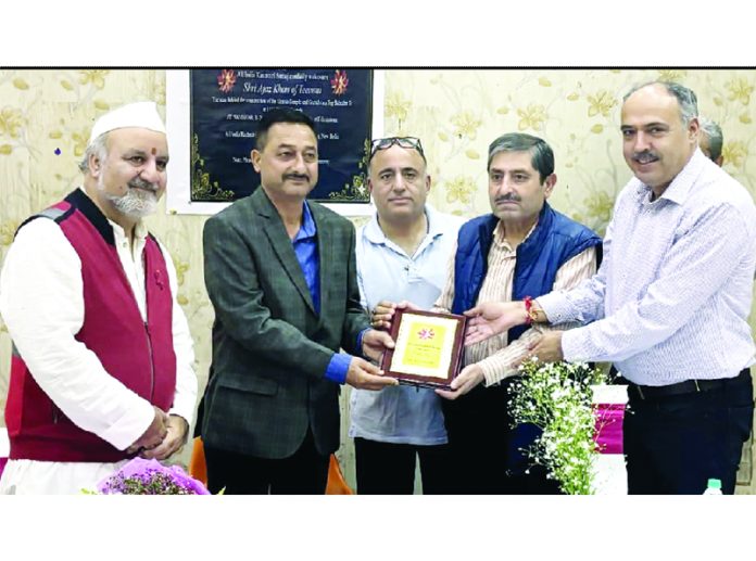 Team AIKS honouring Ajaz Khan at Delhi on Wednesday.