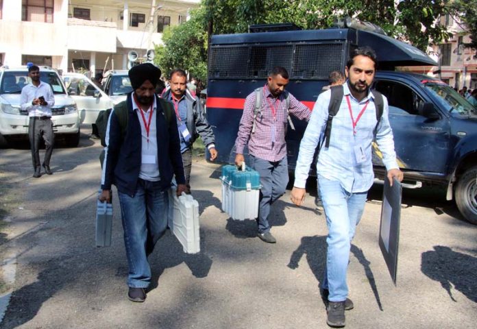 Polling officials leave for Nagrota on Monday. -Excelsior/Rakesh