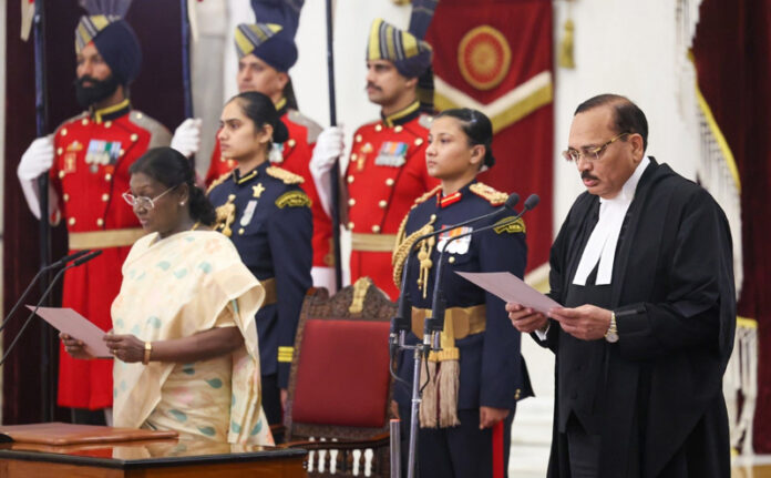 President Droupadi Murmu administers the oath of office to newly appointed CJI Surya Kant in New Delhi on Monday. (UNI)