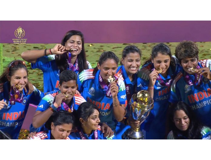 Indian Women’s Cricket Team posing with World Cup Trophy during post match presentation at Navi Mumbai on Sunday.