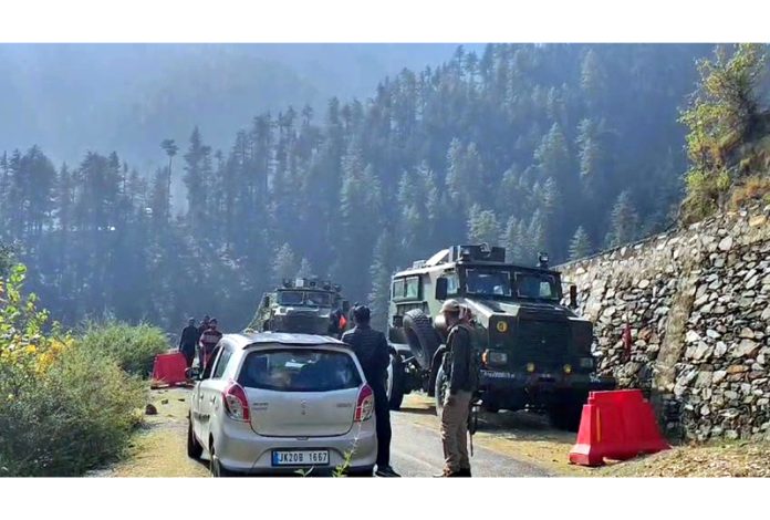 Security forces checking vehicles as searches continue in Chhatru area of Kishtwar on Wednesday.