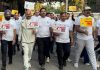 MP (Rajya Sabha) Sat Sharma along with others during Walkathon event at Jammu.