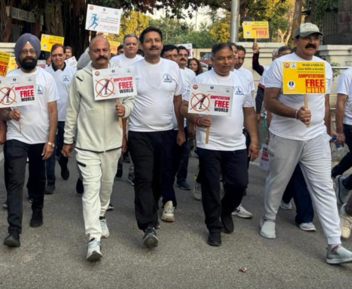 MP (Rajya Sabha) Sat Sharma along with others during Walkathon event at Jammu. MP (Rajya Sabha) Sat Sharma along with others during Walkathon event at Jammu.