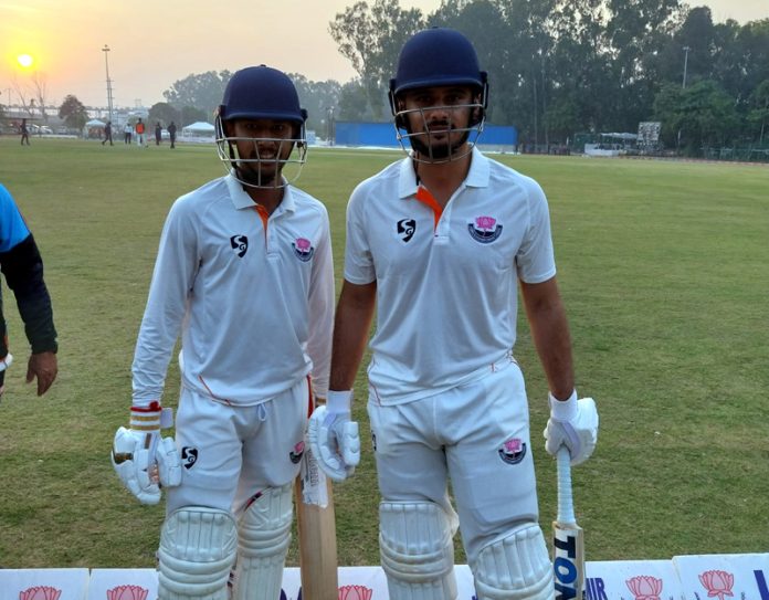 Abdul Samad and Kanhaiya Wadhawan posing after scoring brilliant half centuries.