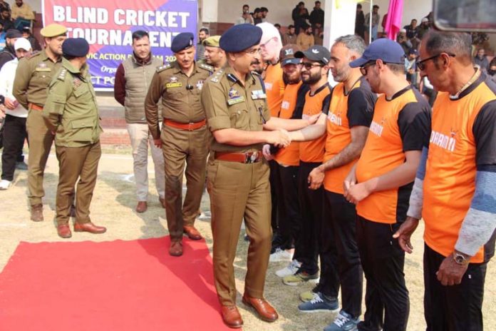 Dignitary interacting with players.