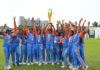 Indian team celebrating while holding trophy at Colombo.