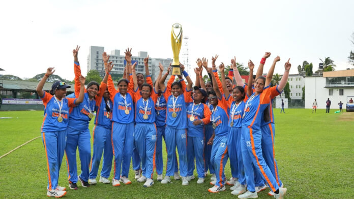 Indian team celebrating while holding trophy at Colombo.