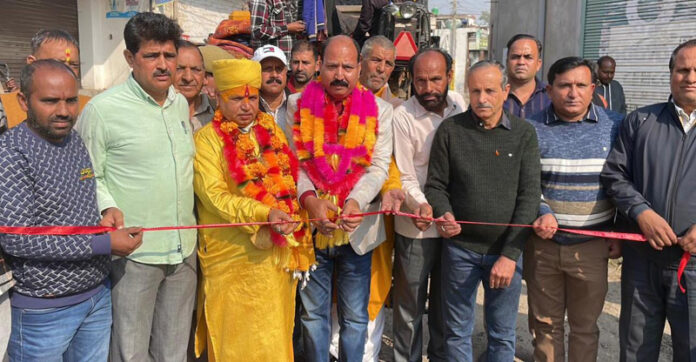 MLA Bishnah, Dr Rajeev Kumar Bhagat inaugurating road from Kheri to Rehal on Monday.