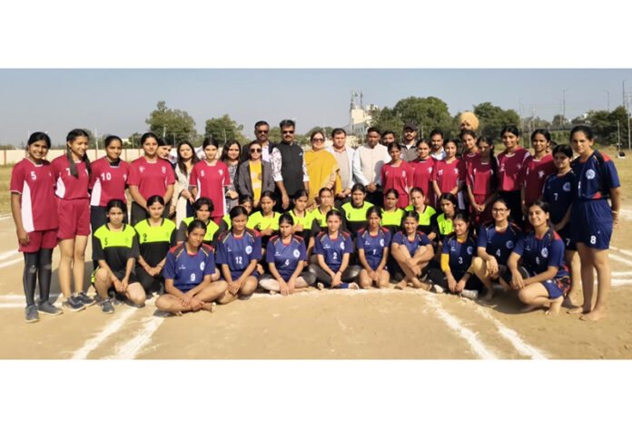 Kho Kho team posing along with dignitaries during a tournament.