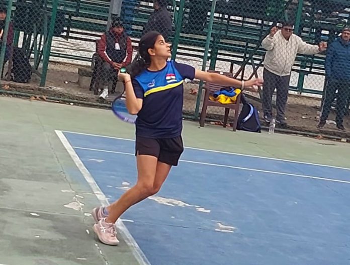 A player smashing the ball in women’s singles of Senior National Soft Tennis Championship at SKISC Srinagar.