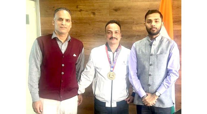 Director Information posing alongwith Gagan Jamwal on clinching Gold medal.