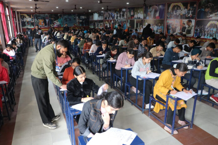 Students keenly participating in scholarship test.