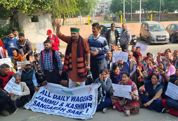 Members of All Daily Wagers Sangarsh Samiti staging a protest in Jammu. -Excelsior/Rakesh