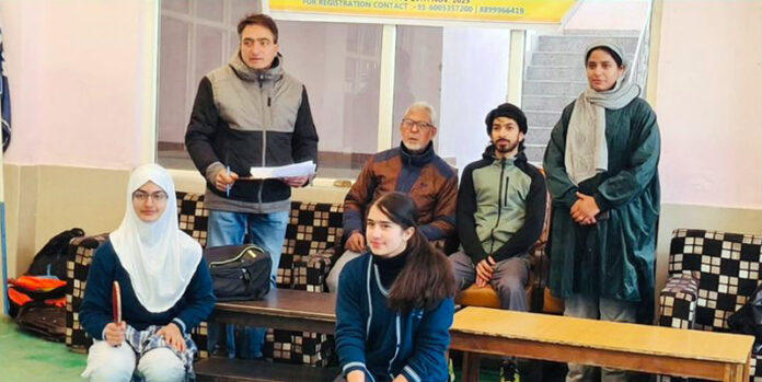 Players and others pose for a photograph at the start of Baramulla Table Tennis Championship on Saturday. Players and others pose for a photograph at the start of Baramulla Table Tennis Championship on Saturday.