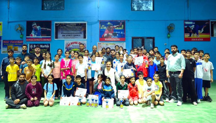 Dignitaries posing along with table tennis players during closing ceremony in Udhampur. Dignitaries posing along with table tennis players during closing ceremony in Udhampur.