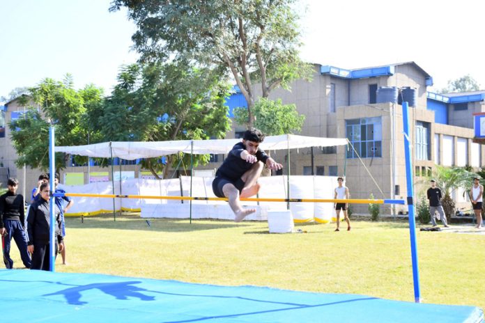 A player in action during an athletic event at Jammu.
