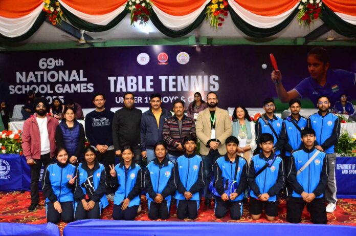 Players posing along with dignitaries during a programme.