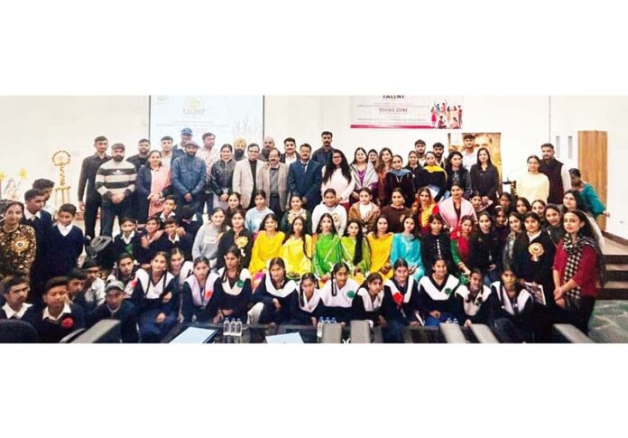 Students posing for group photograph during a programme.