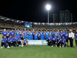 Indian Cricket team posing for a group photograph after defeating Australia.