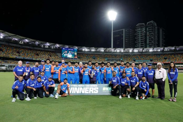 Indian Cricket team posing for a group photograph after defeating Australia.