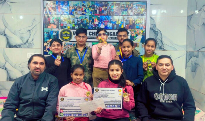 Winners display medals at Khelo Jammu Team Chess competition.