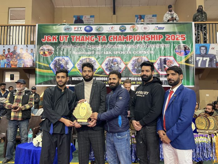 Organisers presenting memento to dignitary.