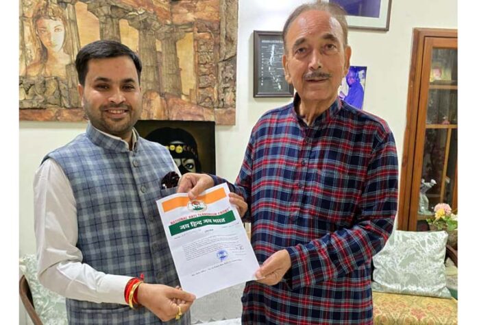DPAP Chairman Ghulam Nabi Azad handing over appointment letter to Vishal Chopra in New Delhi on Wednesday.