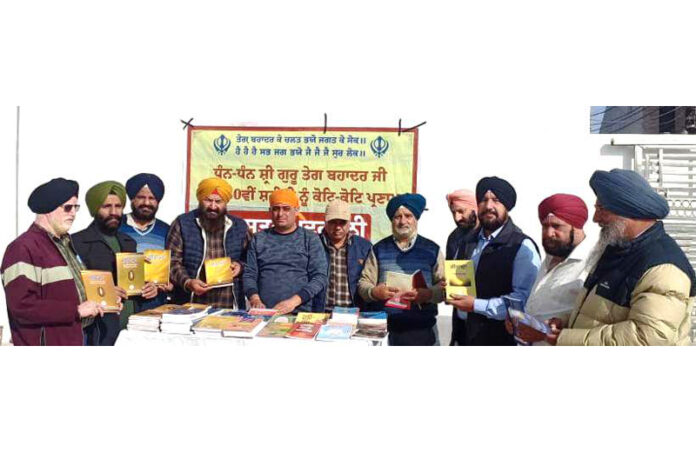 Dignitaries at a book exhibition organised by the JKAACL in Jammu on Saturday.