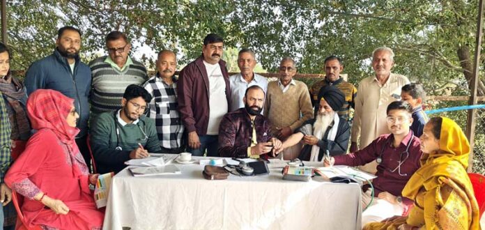 HoD Cardiology GMC & SSH Jammu Dr Sushil Sharma examining patients at Mishriwala on Sunday.