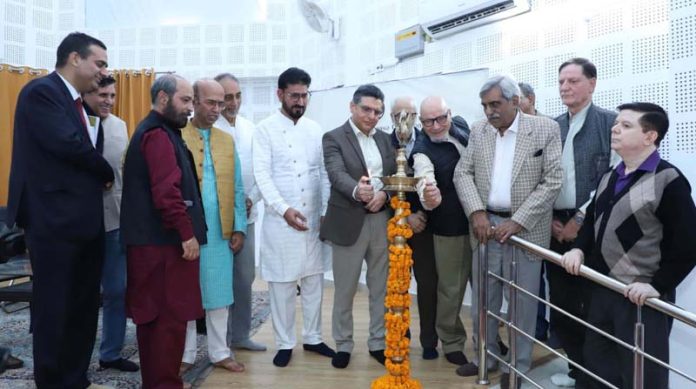 Dignitaries lighting the lamp at a function organized by JIGS at Jammu on Sunday. Dignitaries lighting the lamp at a function organized by JIGS at Jammu on Sunday.